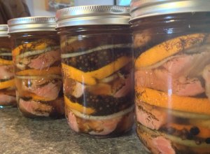 Alaska pickled Salmon in Jars Layered with Oranges, Onions and Brine